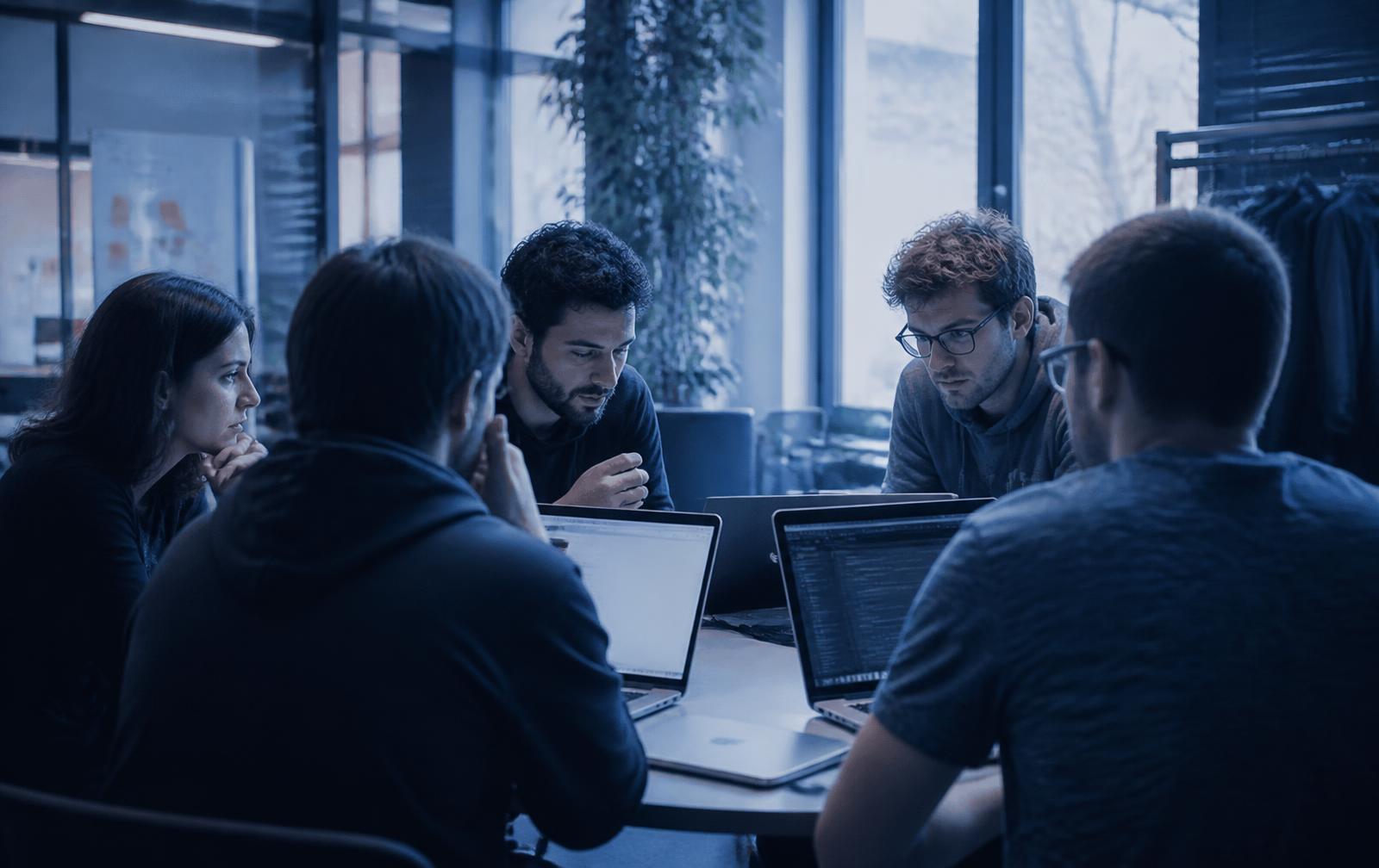 Amplaphi engineers working together at a desk